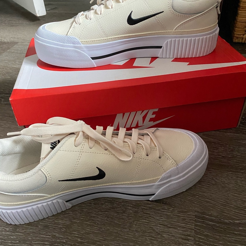 Brand new never worn Nike Cream Sneakers with Black Swoosh